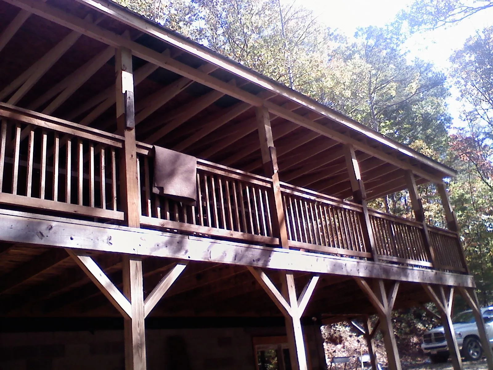 Timber framing under a new elevated porch and deck — Roof Leak Repair in Oxbow by Roofing Brothers